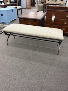 snake skin and metal bench