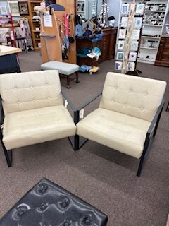 two tufted chairs