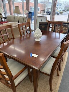 dark wood table and 6 chairs