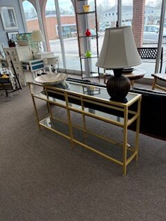 brass and glass console