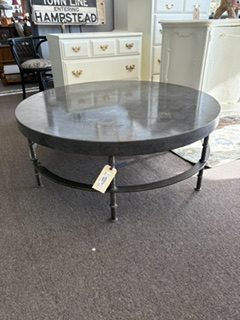 round iron and stone coffee table